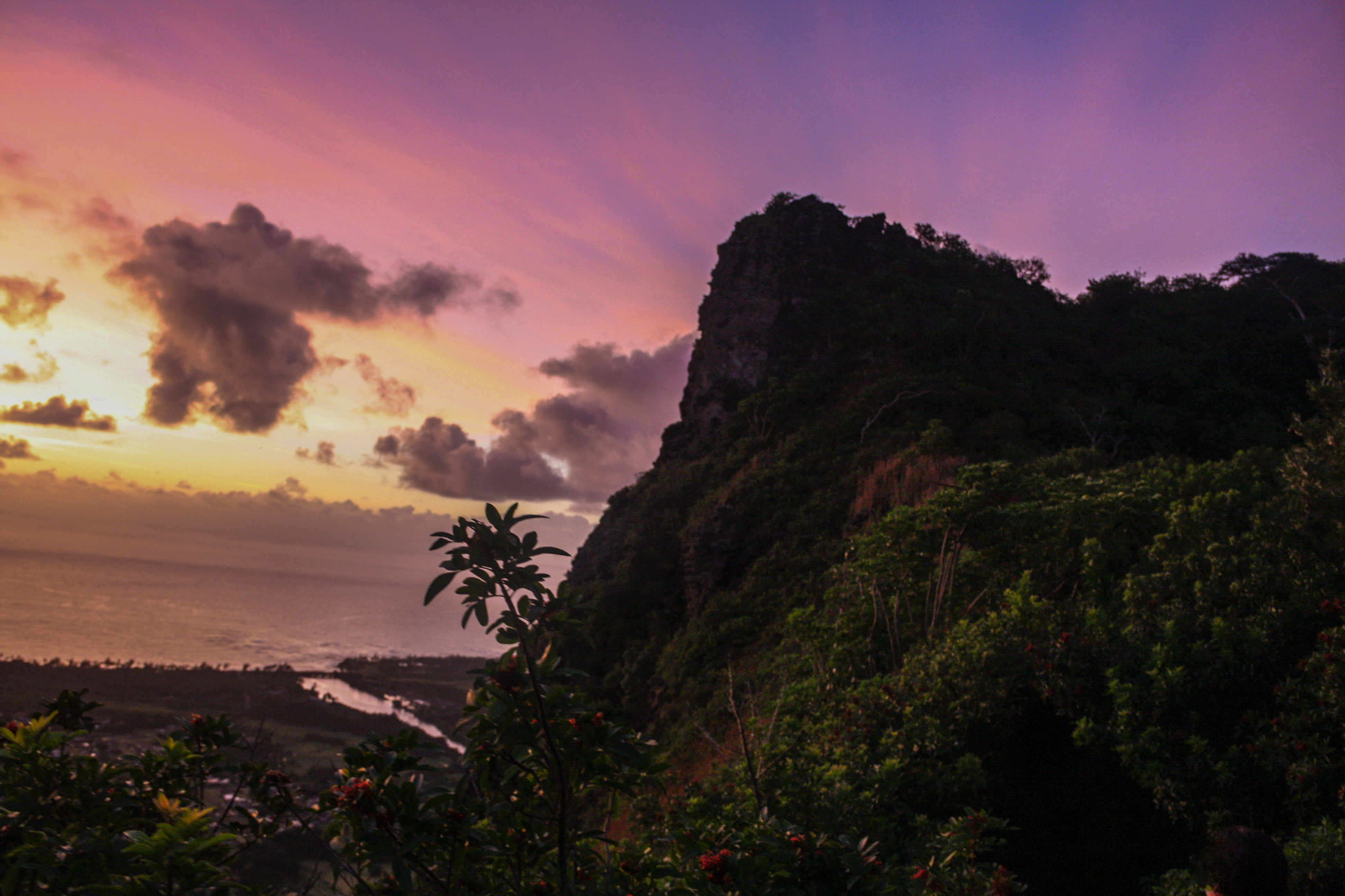 Sleeping Giant silhouetted against the colorful sunrise sky